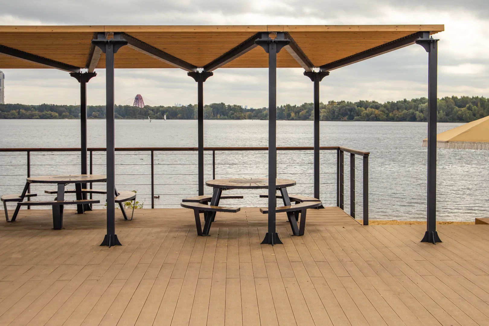 Composite decking with a pergola providing shade over an outdoor seating area